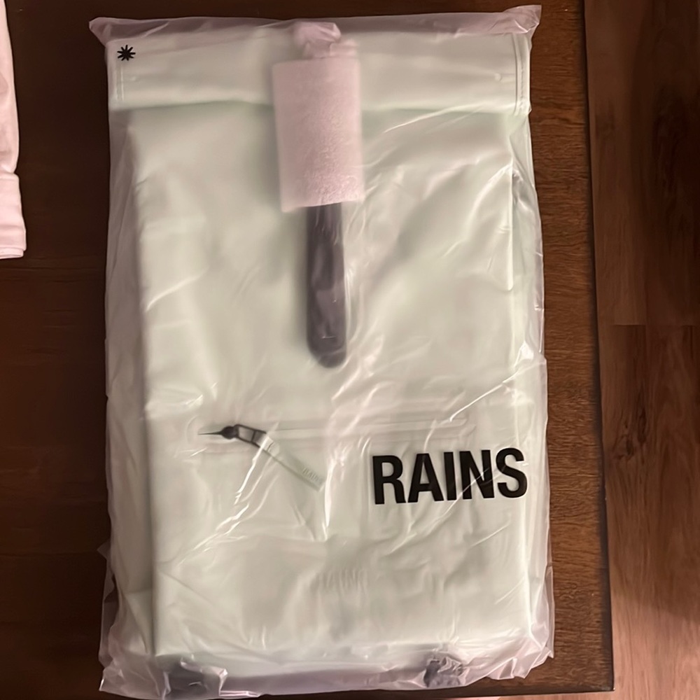 NWT Rains Rolltop Rucksack in Mineral / mint color $125 new in package!